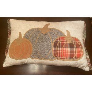 Decorative fall pillow with pumpkins